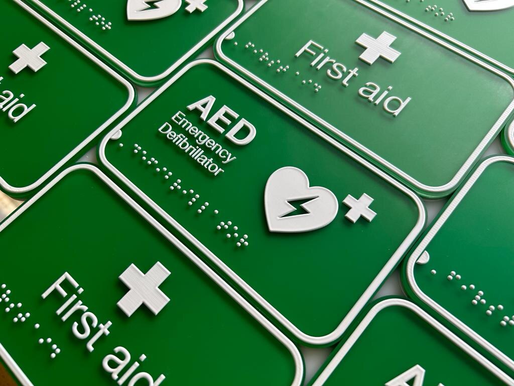 First aid and AED braille safety signs